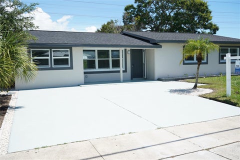 Photo of 311 Country Club Drive, Oldsmar, FL 34677 (MLS # TB8548017)