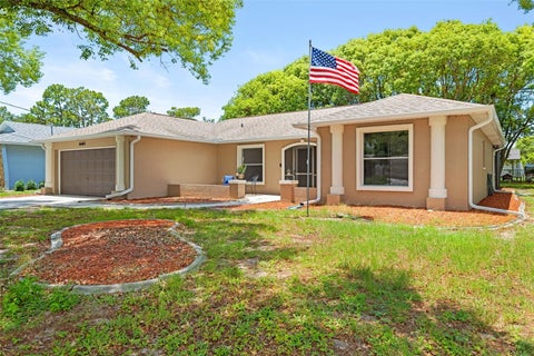 Photo of 11487 Kerridale Avenue, Spring Hill, FL 34608 (MLS # TB8527661)