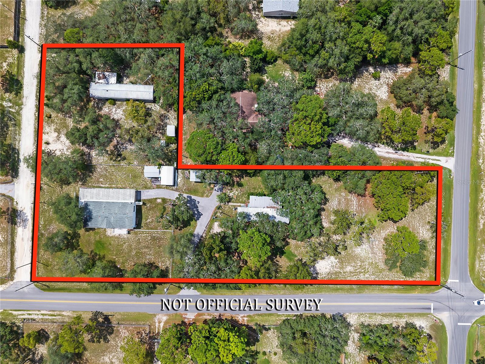 Investor Alert in Homosassa! This unique opportunity features three mobile homes on a total of 1.93 acres one on a 0.93 acre and two more on half-acre lots, all located side by side. The front home is a spacious, move-in ready double-wide. Behind it is a well-kept single-wide with rental potential, and to the right, a single-wide on its own full acre that just needs some cleanup and TLC to shine.
Perfect for generating rental income or multi-family living. Just minutes from Homosassa Springs Wildlife State Park, the Homosassa River, and only 15 minutes to Crystal River known for its manatees, boating, and charming downtown. Convenient to shopping, dining, and public boat ramps. Don’t miss out on this income-producing property in a fast-growing area!