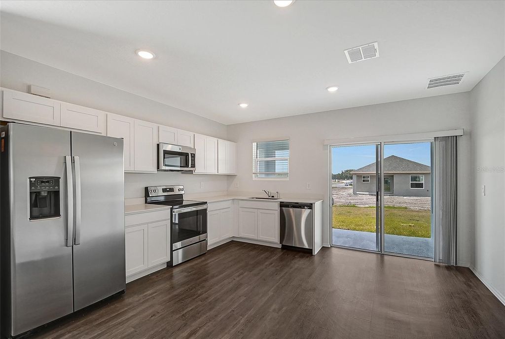 Photo of 13028 Sassafras Trl, Parrish, FL 34219 (MLS # A4695324)