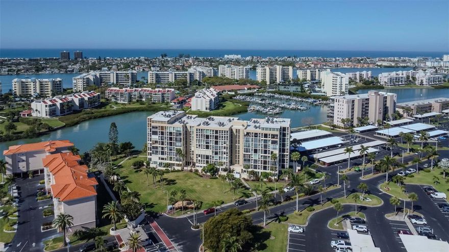 Rare 10-foot ceilings set this beautifully updated two-bedroom, two-bath condo apart from the rest of the Ambassador building at Bay Island — a feature not found on other levels and one that, combined with the extensive upgrades throughout the home, creates a bright, open space with a modern feel rarely found in this community. These distinctive features make this residence stand out among other units currently available in Bay Island.

The completely renovated kitchen features white shaker cabinets, crown molding, tray ceiling, recessed lighting, gorgeous quartz countertops, and brand-new matching stainless steel appliances. Both bathrooms have been thoughtfully remodeled with contemporary finishes and clean design. The open layout connects the kitchen, dining, and living areas, creating a comfortable space that works equally well for everyday living or entertaining guests. The home also includes luxury vinyl plank flooring and hurricane-impact windows and doors.

A versatile den/office provides valuable additional living space that can easily serve as a home office, den, sitting room, or even a comfortable space to unwind at the end of the day. Filled with natural light, this inviting area adds flexibility to the home and is a feature you won’t find in most condos in the building.

Residents of the Ambassador building enjoy access to two shared balconies, offering inviting spaces to relax and take in the waterfront setting and coastal breezes. Bay Island residents enjoy a wide array of resort-style amenities, including multiple swimming pools, tennis courts, a fitness center, clubhouse, marina, and a scenic waterfront walking path. The location places you close to award-winning Gulf beaches, excellent dining options, shopping, medical services, and the entertainment and nightlife of St. Petersburg.

The condominium association fee covers almost everything, including 24-hour guarded gate entry, cable and internet, water, sewer, trash, flood insurance, and exterior maintenance, providing a convenient and low-maintenance lifestyle.

If you’ve been looking for a move-in-ready condo with unique features and a welcoming waterfront community, this Bay Island residence may be exactly what you’ve been waiting for.
