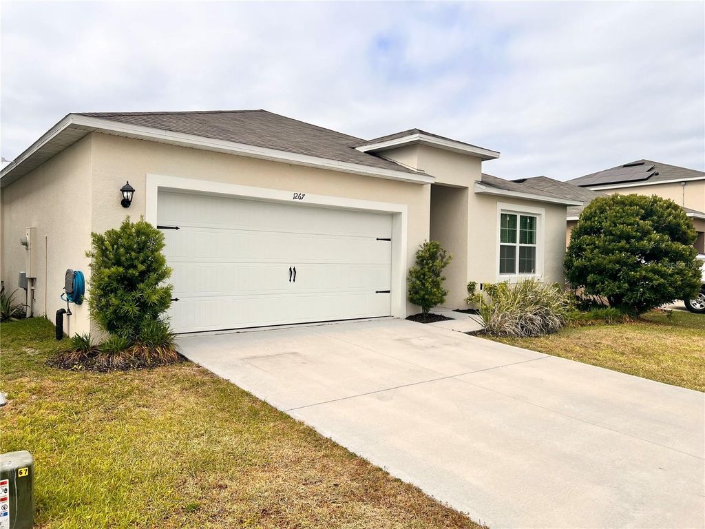 Photo of 1267 Iguana Loop, Davenport, FL 33897 (MLS # O6406849)