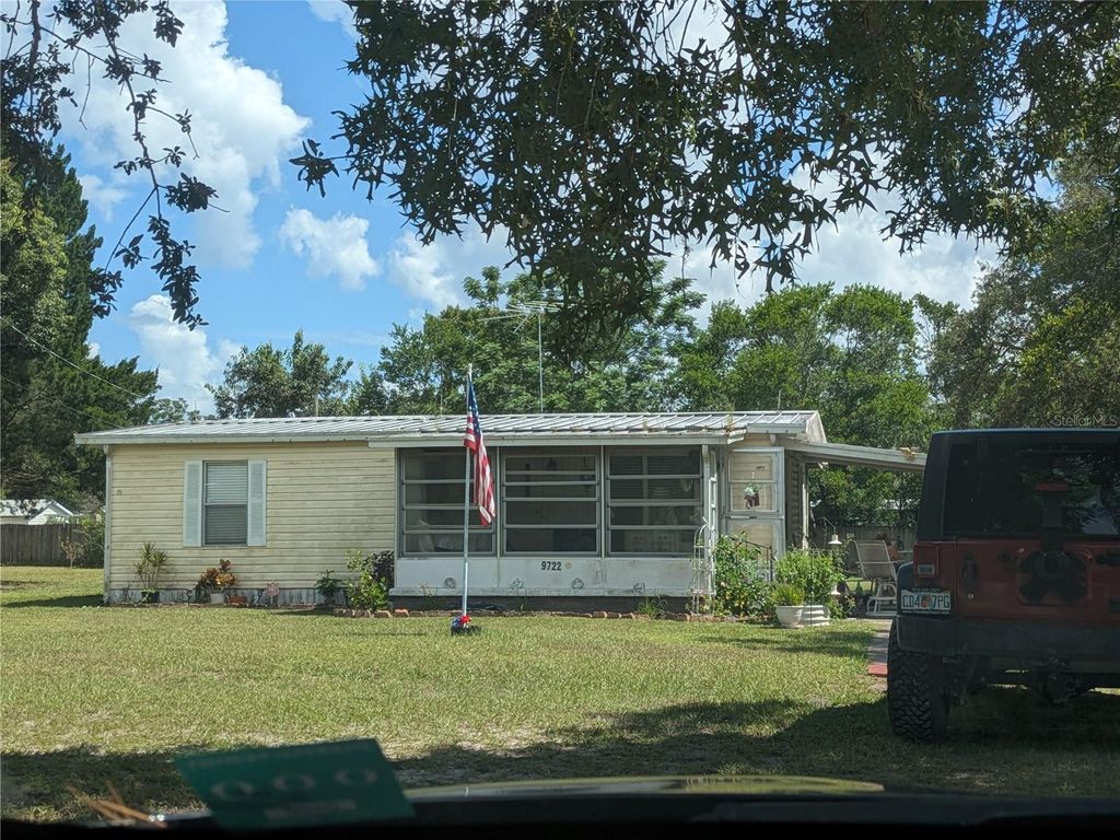 Photo of 9722 Ray Street, Hudson, FL 34669 (MLS # TB8418549)