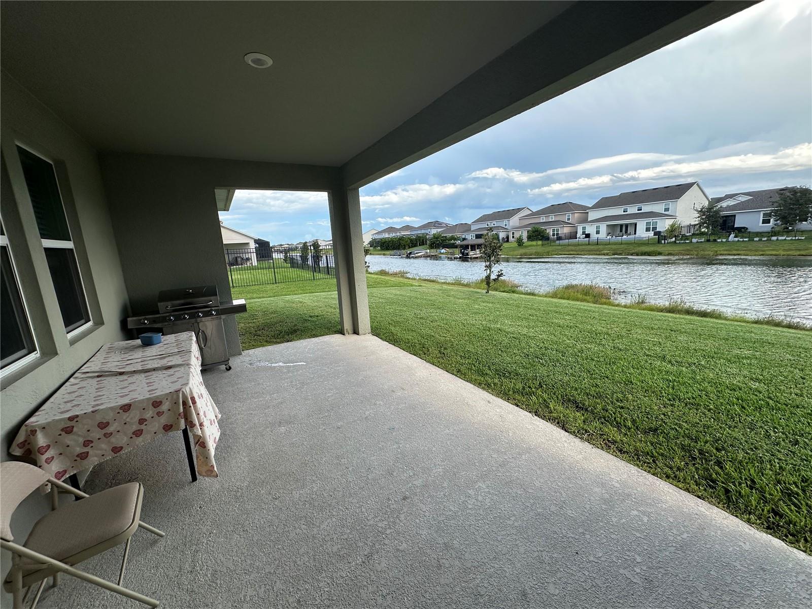 Welcome to our young home with gorgous water view! This home has the class and charm that you have been waiting for in a single story home. This masterpiece has four bedrooms, two and half bathrooms and a tandem 3 car garage. There is a lovely covered porch and welcoming foyer in the entry. The kitchen features a large island with a breakfast nook that overlooks an expansive family room. The family room leads to a beautiful covered and screened patio in which you can enjoy your breathtaking backyard views. The master bedroom has a spa inspired master bath with a walk in shower and his and her sinks. There is also an large luxurious walk in closet accessible through the master bathroom. Solar Pannels are availble for this home for big savings of your electrical bills, tenant is responsible for solar system rental of $68/mo. which saves utlity bills every month. Hanover Lakes is a much sought after waterfront community. Perfect for boating, fishing and enjoying nature. Amenities to include: Dock and lift to the Chain of Lakes, Splash Park, Resort Style Swimming Pool and Cabana. Hanover Lakes’ also has a great location. Minutes away from the Florida Turnpike with tons of shopping and dining options such as Harmony Farmers Market, it is convenient to get anywhere you need. Your family will love living and creating memories together at Hanover Lakes.