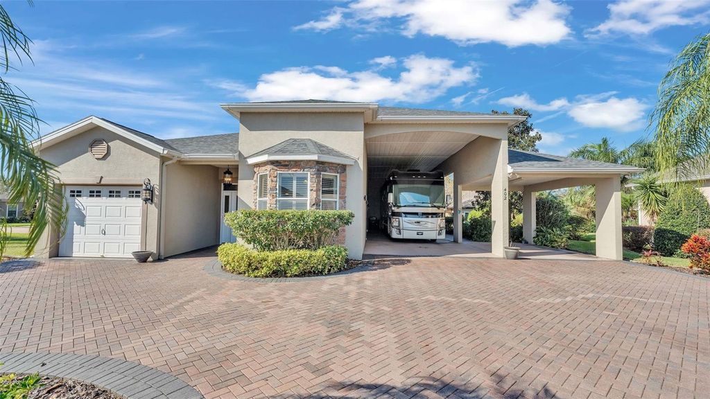 Photo of 402 Cruisers Drive, Polk City, FL 33868 (MLS # L4956231)