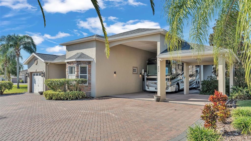 Photo of 402 Cruisers Drive, Polk City, FL 33868 (MLS # L4956231)