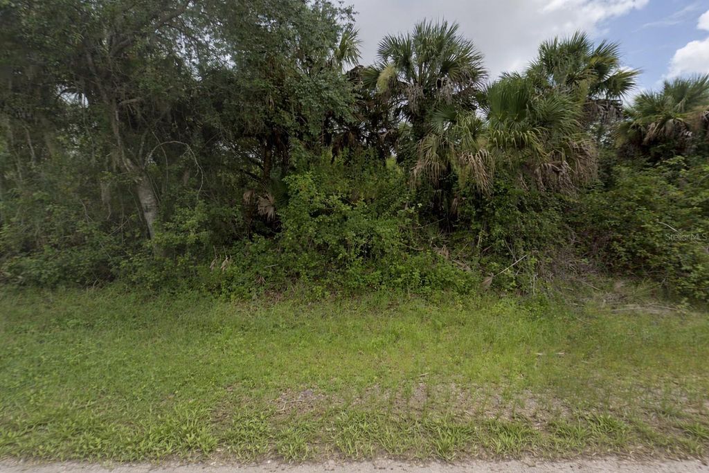 Photo of 515 Mcdill Drive, Port Charlotte, FL 33953 (MLS # C7521150)