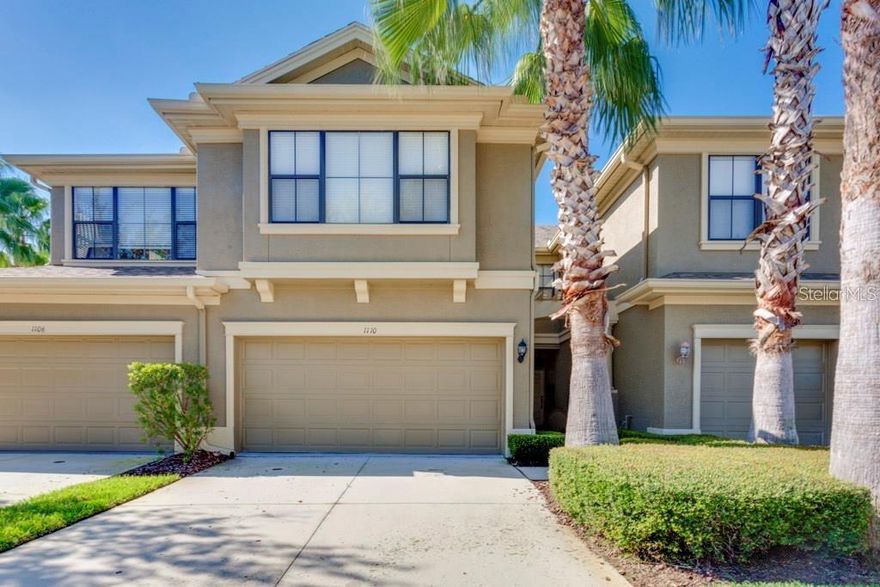 Welcome home! Spacious 2 Bedroom/2.5 Bathroom/2 car garage + Bonus Room townhome located in North St Pete minutes to the Howard Franklin Bridge. Home offers an open concept, where the living & dining room areas open to a screened patio with great views of a lake and fountain. Kitchen has been updated with quartz countertops, stainless steel appliances, and has a breakfast area. This updated townhome offers high ceilings, crown molding, vinyl flooring downstairs, and a new high-quality, plush carpet in the bedrooms upstairs. Both bedrooms are oversized and fit a king-size bed. The primary bedroom is full of light (South facing) and has an updated bathroom with a walk-in shower. Enjoy great views of a large lake from the primary bedroom. The second bedroom is also filled with natural light and fits a king-size bed. The second bathroom has granite countertop, large closet, and a tub. Upstairs there is an oversized bonus/media room/office area with access to a washer/dryer. The two-car garage is ideal for storage. Bay Isle Townhomes is a quiet, well-maintained community with lush landscaping, palm trees, and the beautiful community pool is just steps away from this home. Centrally located in North St Pete, this home is ideal for someone commuting to Tampa, Downtown St. Pete, or south to Sarasota. FULLY FURNISHED option can be discussed. Townhome is available on January 1, 2026.