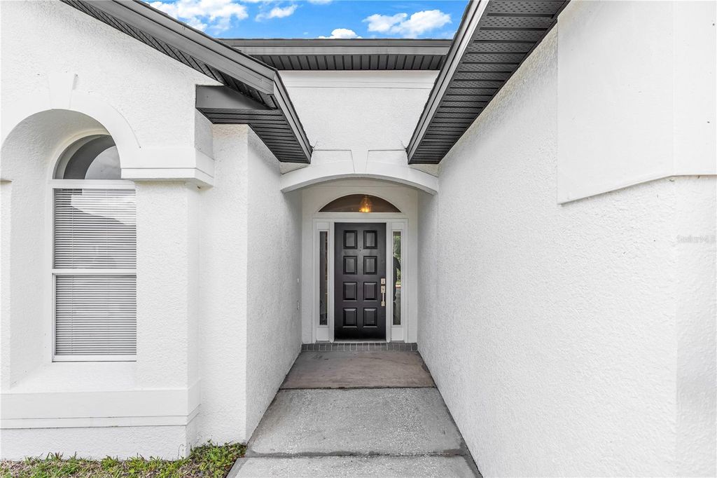 Photo of 1016 Lake Biscayne Way, Orlando, FL 32824 (MLS # O6400993)