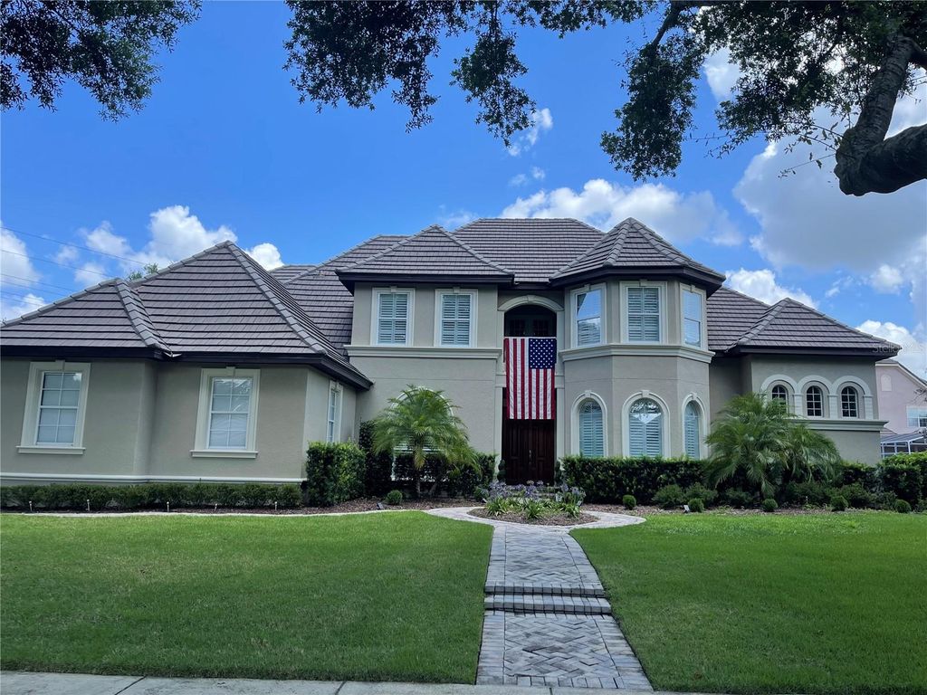 Photo of 8734 Crestgate Circle, Orlando, FL 32819 (MLS # O6391734)