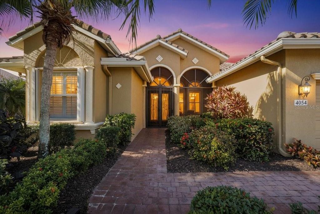 Photo of 4054 65th Place E, Sarasota, FL 34243 (MLS # A4676123)