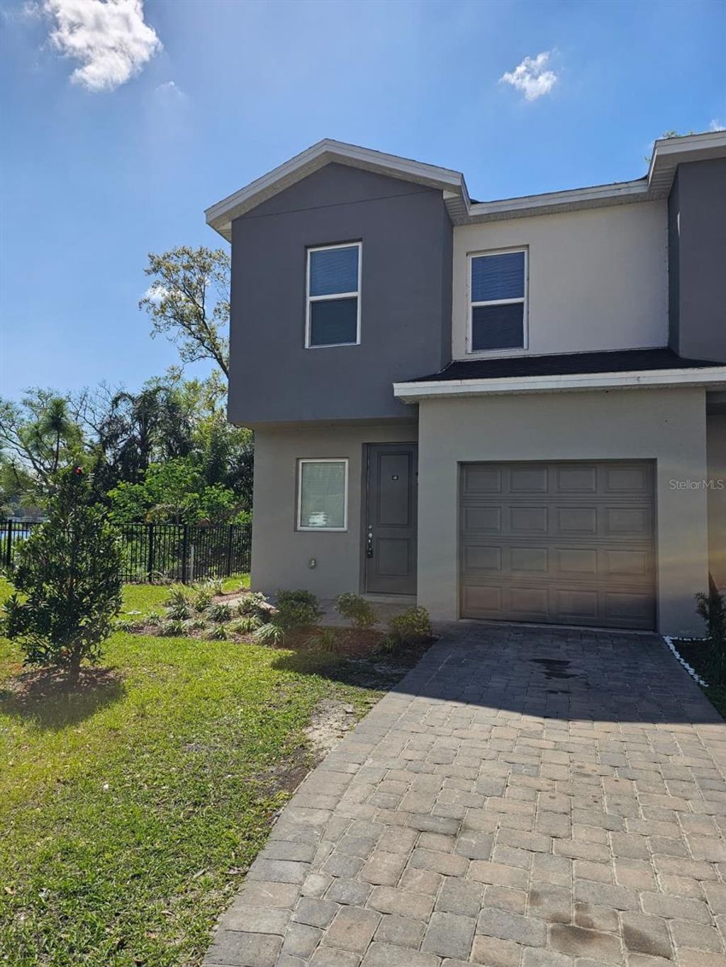 Photo of 1213 Southstation Pl #406, Orlando, FL 32809 (MLS # O6394630)