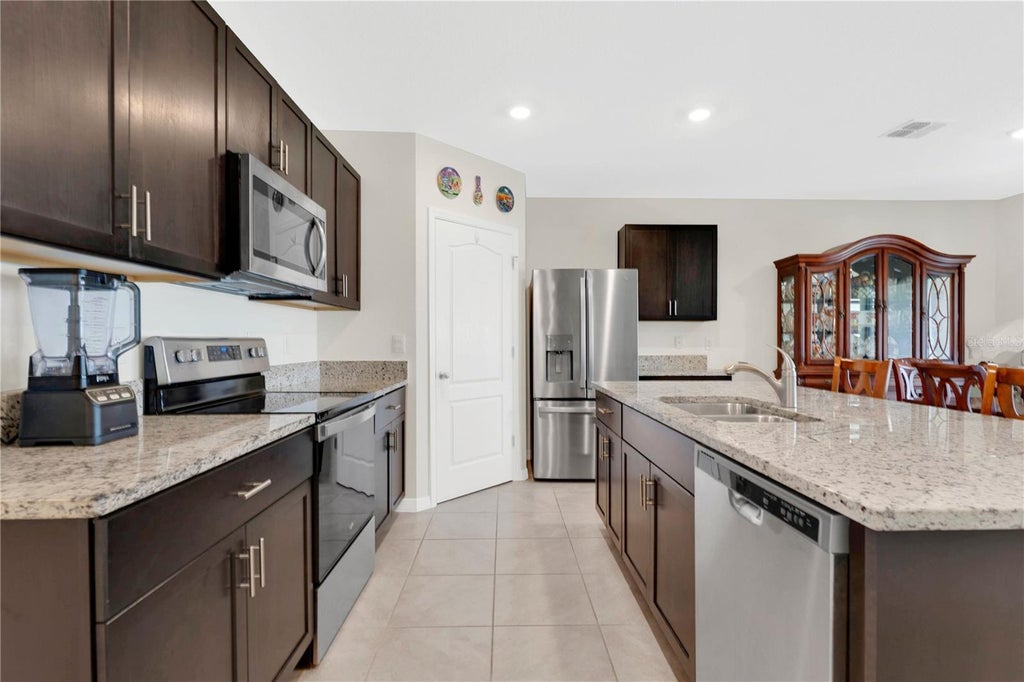 Photo of 1735 Park Side Avenue, Kissimmee, FL 34744 (MLS # O6431257)
