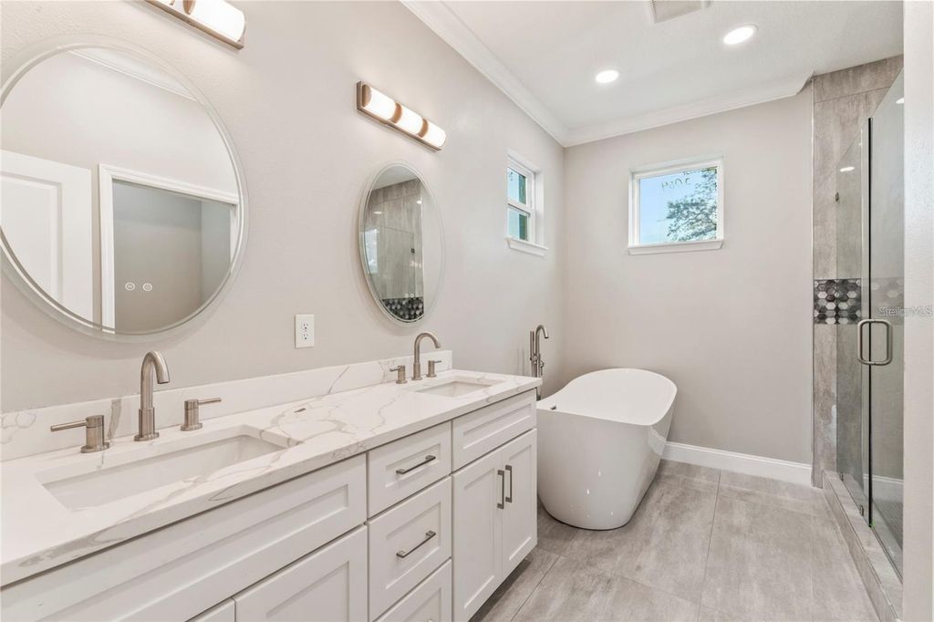 Photo of 809 W Linebaugh Avenue #1B, Tampa, FL 33612 (MLS # TB8498614)