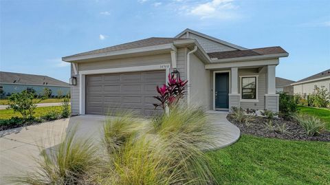 Photo of 14560 Skipping Stone Loop, Parrish, FL 34219 (MLS # A4675532)