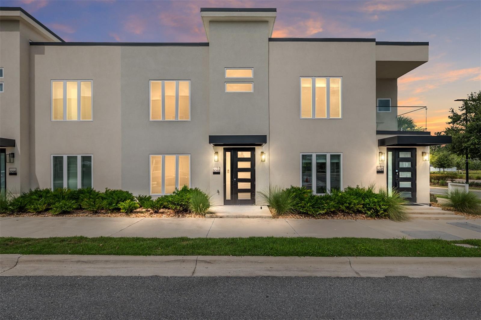 MOVE-IN READY! This modern and stylish 2-story residence offers 3 bedrooms, 2.5 bathrooms, a 1-car garage, and 1,640 square feet of thoughtfully designed living space in the highly sought-after community of The VUE at Celebration Pointe. Step inside to discover a bright, open floor plan featuring quartz countertops throughout, sleek cabinetry, luxury plank flooring, and stainless steel appliances. The spacious kitchen flows seamlessly into the dining area and living room, creating the perfect layout for entertaining. Just beyond, a private outdoor garden patio extends your living space. The primary suite is a true retreat, offering a large bedroom, walk-in closet, and a beautifully designed en-suite bathroom. Two additional bedrooms provide comfort and flexibility for guests, family, or a home office. This home offers privacy and peace of mind with a full 12-inch insulated wall between homes, noise-reducing insulation, sound-dampening subfloors, and energy-efficient features including a tankless water heater, insulated windows, and a high-efficiency HVAC system, all helping to reduce utility costs. Residents of The VUE enjoy access to resort-style amenities including a pool, jacuzzi, cabana, and park-like green spaces, all for a low $300 monthly association fee. Celebration Pointe’s shopping, dining, and entertainment are just steps away, and a brand-new HCA hospital is coming soon across the street and minutes from the VA and UF Shands hospitals, adding even more convenience to this prime location. Don’t miss this opportunity to be part of the vibrant Celebration Pointe lifestyle.