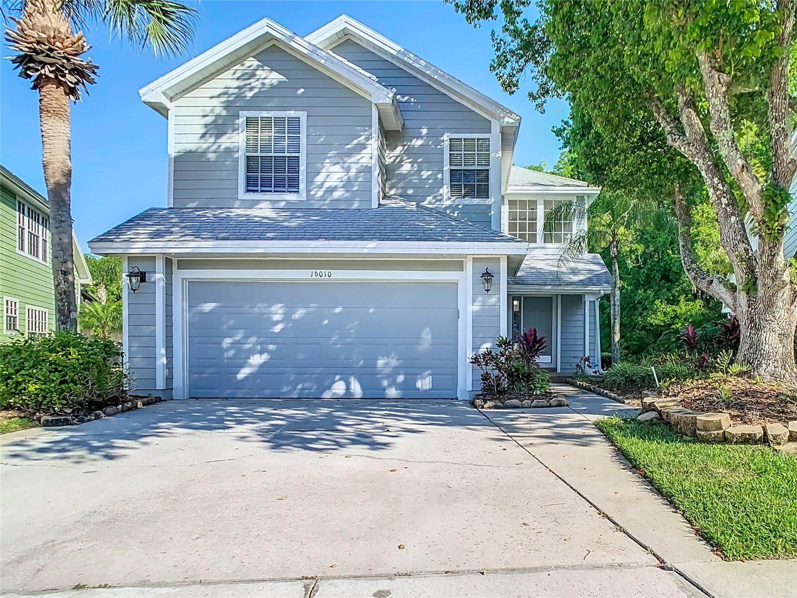 One or more photo(s) has been virtually staged. Welcome to this stunning, move-in ready 3-bedroom, 2.5-bathroom home located in the highly desirable gated community of Sterling Manor within Tampa Palms. Featuring modern updates, custom finishes, and breathtaking outdoor living spaces, this property offers the perfect combination of comfort, style, and serenity.
Inside, you’re greeted by a grand foyer with soaring ceilings and laminated waterproof flooring that flows seamlessly throughout the main living areas and into the 2nd floor and bedrooms. The open-concept design features a custom stone accent wall with a dual-sided fireplace connecting the great room and family room, making it perfect for entertaining.
The kitchen boasts custom cabinetry, granite countertops, stainless steel appliances, and a functional layout ideal for everyday living and gatherings. Upstairs, the spacious primary suite features cathedral ceilings, dual closets (including a walk-in), and a luxurious en suite bathroom with dual vanities, a soaking tub, and a stand-up shower.
Step outside to your 35’ x 17’ screened lanai overlooking lush conservation views and a serene pond truly the best of both worlds. Enjoy both enclosed and open sections for year-round outdoor living. The oversized lot includes beautiful landscaping, privacy screens, and tranquil outdoor sounds, creating your own private retreat.
Additional highlights include:
Brand-new roof (Sept 2025)
New AC unit (2024)
2” faux wood blinds throughout
Upgraded fans and light fixtures
Tile flooring throughout the first floor
Owned Water Softer
The community offers low HOA fees that cover lawn care, landscaping, mulching, mailbox maintenance, gates, and road upkeep. Living in Tampa Palms means access to five community parks, pools, tennis courts, skate parks, playgrounds, and the prestigious Tampa Palms Golf & Country Club. Conveniently located near top-rated schools, shopping, dining, hospitals, entertainment, and nature preserves, all while being just under an hour from the beaches.
This home is move-in ready and offers a rare combination of luxury, privacy, and functionality. Don’t miss this chance to own a piece of paradise in one of Tampa’s most sought-after communities!