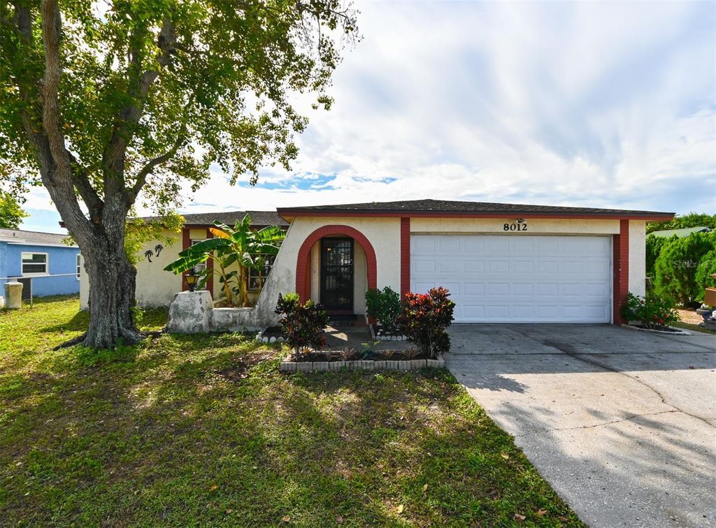 Photo of 8012 Embassy Boulevard, Port Richey, FL 34668 (MLS # TB8443441)