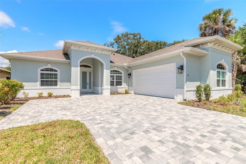 Photo of 61 N Riverwalk Drive, Palm Coast, FL 32137 (MLS # V4950080)