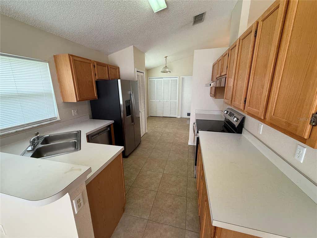 Photo of 113 Prairie Dune Way, Orlando, FL 32828 (MLS # O6431820)
