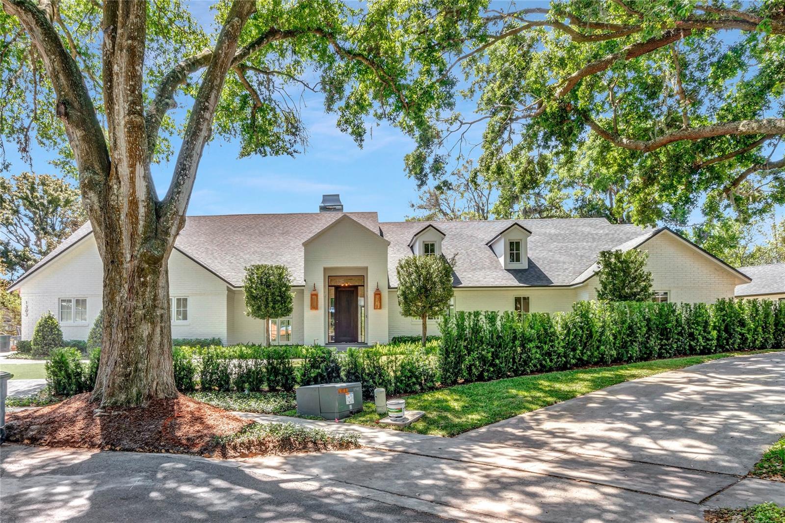 Welcome to this exquisite French Modern home that seamlessly blends classic architecture with modern amenities. With 4 bedrooms, 4.5 bathrooms, 4,055 s/f, and a detached art studio, this stunning, single story property offers the ultimate in luxury living.
The open floor plan of the main living area effortlessly flows from the gathering room with a cozy fireplace to the dining and sitting room. The kitchen features Wolf, Sub-Zero appliances, custom cabinetry, and a large center island perfect for entertaining guests.
Step outside into this stunning oasis, where every detail has been meticulously designed to create the ultimate in relaxation and entertainment. With a pool, Casita, fire feature, and summer kitchen, this outdoor space is the perfect retreat for enjoying the warm weather. The oversized lot extends to another highlight of this home, a separate art studio. This studio is bathed in natural light and will provide the perfect space for creative pursuits or as an office.
Located in Winter Park, this stunning French Modern home offers the perfect combination of luxury and functionality. Don't miss the opportunity to make this your dream home!