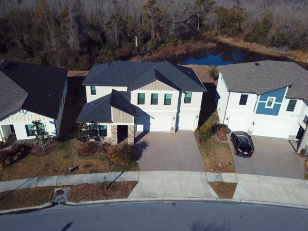 Photo of 21397 Snowy Orchid Terrace, Land O Lakes, FL 34637 (MLS # TB8476426)