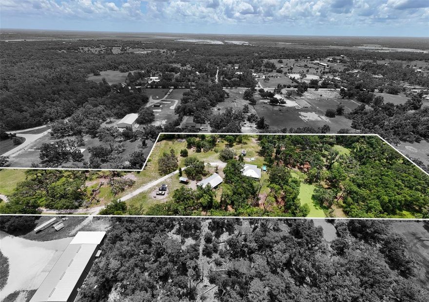 Secluded Sarasota Oasis (Built in 2008)  – 8.8 Acres of Peace & Possibilities

Welcome to your private paradise in Sarasota, just minutes from rapidly growing Fruitville Rd! Built in 2008 and Nestled on nearly 9 acres of lush, secluded land in a highly desirable X flood zone, this exceptional 3-bedroom, 2-bathroom home offers the perfect blend of rural tranquility and modern convenience—just minutes from shopping, dining, top-rated schools and more. 

This 1,800 sq ft home features an inviting open floor plan under a durable metal roof, ideal for entertaining or enjoying peaceful, spacious living. The gourmet kitchen is a chef’s dream, boasting a center island, breakfast bar, stainless steel appliances, gas stove, and a pass-through window to the screened-in back porch—perfect for indoor-outdoor Florida living.

The spacious master suite is a true retreat with tall tray ceilings, a large walk-in closet, and a luxurious en-suite bathroom complete with a walk-in shower, jacuzzi tub, and plenty of natural light.

Outside, enjoy room to roam, play, or simply relax under the shade of mature trees. The property includes a custom playhouse, a whole home generator, on-site propane tank (owned), and a versatile barn/living quarters equipped with its own kitchen, bathroom, running water, and electric—ideal for guests, extended family, or as an income-producing rental or workshop. The barn is also outfitted with 3 stalls if you want to house horses or other animals.

Upgrades include New Washer, Dryer, and Fridge (2023), New AC (2024), New Hot Water Heater (2024), Whole House Water System Updated (2025), New Storm/Impact Resistant Windows, Sliders, and Gutters (2022), Above Ground Pool (2024)

Whether you’re looking for a serene homestead, a multi-generational setup, or a private retreat with expansion potential, this unique Sarasota acreage checks all the boxes.

Don’t miss the chance to own this rare blend of privacy, functionality, and location!