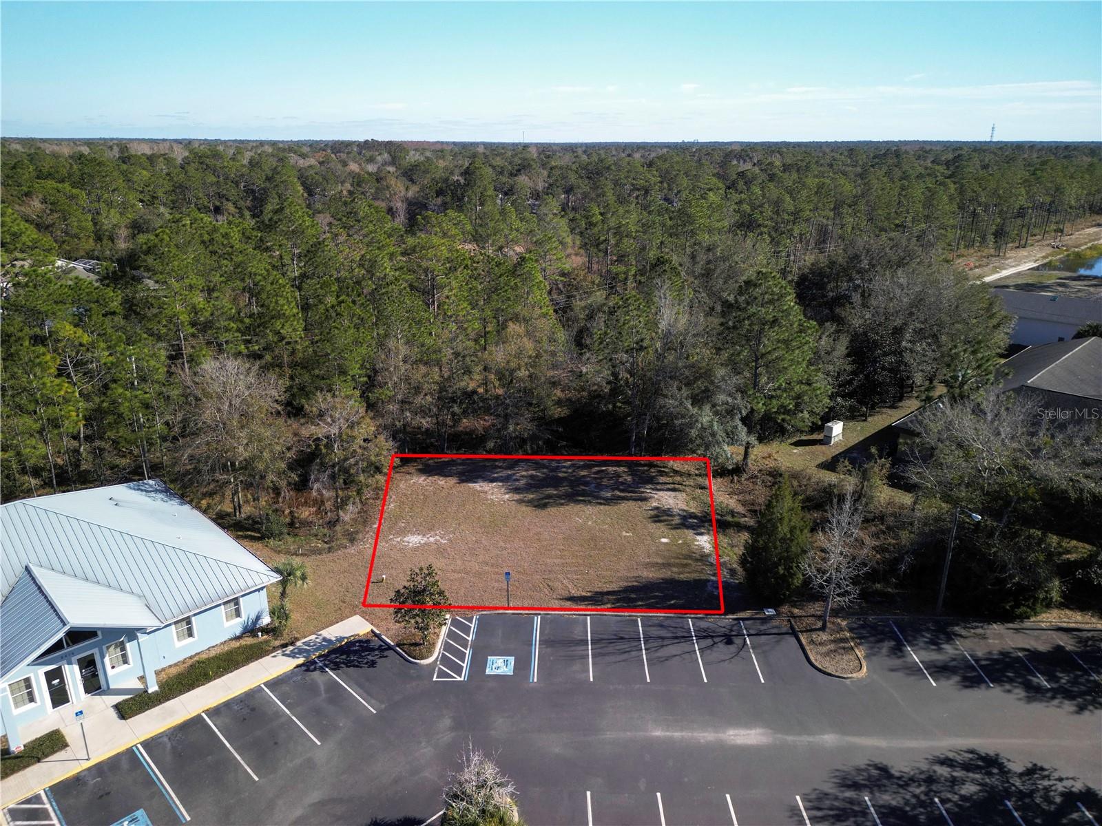 Looking to open your business in one of Citrus County's busiest business centers? Well then look no further ! Located in the Sugarmill Woods district of Homosassa, this lot is ready to build. It is cleared, padded with public utility connections, an approved building footprint with designated paved parking.