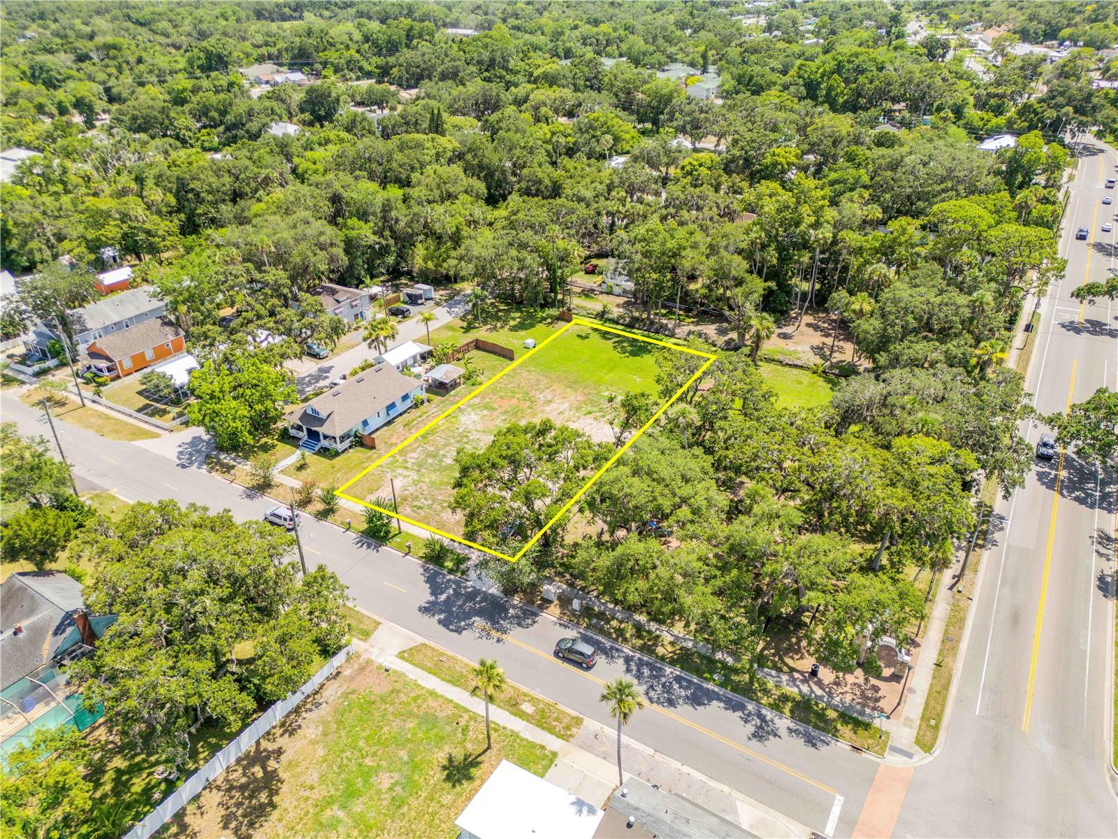 Development Opportunity – Zoned R-5. Situated just minutes from the vibrant Canal Street Historic District and a short ride to the beach, this cleared 0.45-acre lot is a prime canvas for new residential development. Zoned R-5 (Urban Single-Family Residential), the parcel allows up to three single-family or modular homes, each on a minimum 5,000 sq ft lot. With no structures to demolish, utilities nearby, and excellent street frontage (91 feet wide), the lot is ready for immediate subdivision and development. Whether you’re a builder looking to create a small cluster of homes or an investor seeking strong long-term rental yield, 108 S Myrtle Ave offers flexibility, location, and real growth potential.
Located in one of New Smyrna Beach’s most up-and-coming infill areas—close to shops, schools, dining, and the Intracoastal—this opportunity won’t last long.