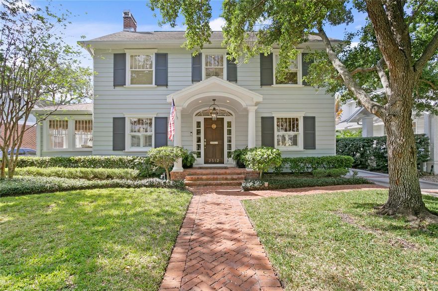 This beautiful and sophisticated 1930’s center hall colonial and guest house is situated on a picturesque tree-lined street in New Suburb Beautiful. With all the charm and history that you love, along with today’s modern touches, this 5 bedrooms and 3.5 baths main home, along with a 1 bedroom, 1 bath guest house with living space and kitchenette, offers ample living space and is perfect for entertaining. A stately foyer centers the large formal dining room and a separate living room with gas fireplace, which leads to a bright and sunny Florida room. The high-end kitchen features Sub Zero appliances, island and a butler’s pantry with wet bar, as well as pantry or storage space and laundry. The spacious family room has a fireplace flanked by beautiful built-ins and Sonos speakers. On the second floor, the large primary bedroom suite (21x17) features beautiful vaulted ceilings, a walk-in closet and en-suite bathroom with double vanity. Four additional bedrooms and two fully renovated full bathrooms complete the second floor. A walk-up finished third floor room serves as a bonus room or storage space. French doors off the family room and a Dutch door off the kitchen lead to a covered brick patio and a spacious, fenced backyard with room for a pool. The detached garage with workshop and additional storage has a second floor with an 832 square foot guest house with a living room, full kitchen, bedroom and bathroom. This stately home has beautiful millwork and new paint and lighting fixtures throughout, a new second floor AC, and a whole-house water filter and softener, along with ample storage.  Conveniently located near restaurants, shopping, Hyde Park and Bayshore Boulevard.