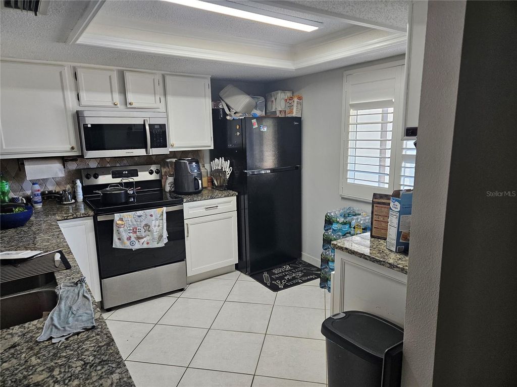 Photo of 2900 Grovewood Boulevard E #C, Palm Harbor, FL 34683 (MLS # TB8497739)