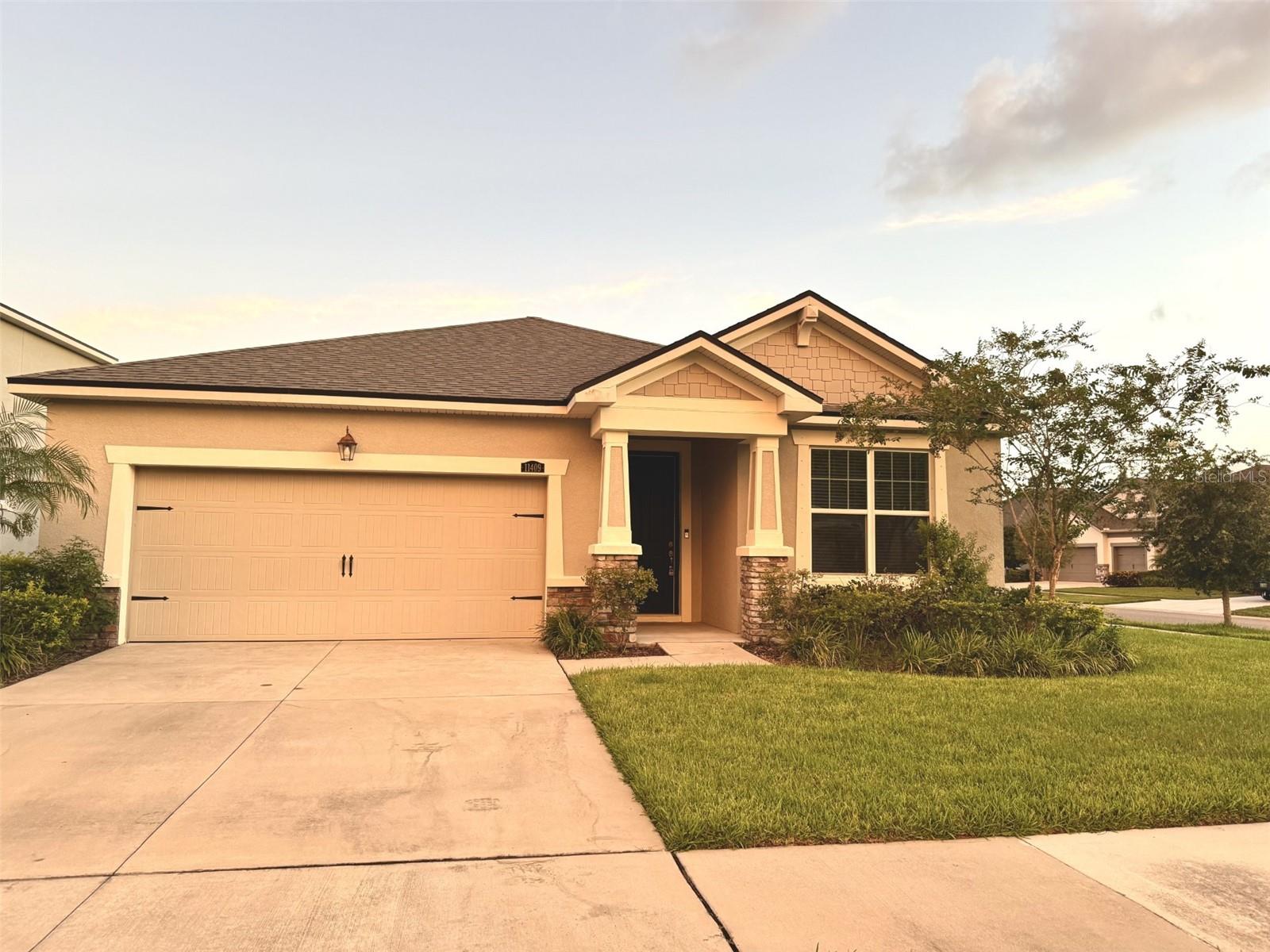 Great schools for your kids! Charming open floor plan. Over 2000 sq ft with three bedrooms plus a study room. The large owner's suite features a spacious walk-in closet, and the owner's bath is complete with a large shower and a dual sink raised vanity. The two secondary bedrooms are located down a hallway and share a full bath. The study, situated in front of the house, is a great room for an at-home office, playroom, or formal sitting area. Wood cabinets with contrasting Quartz countertops in Iceberg. The island features a breakfast bar that overlooks the gathering room. Stainless Steel Appliances. A huge corner lot with a beautiful view. Located in Boyette Park, you also have access to a community zero-entry pool, playground, dog park, and more! Short drive to 75, grocery, and schools