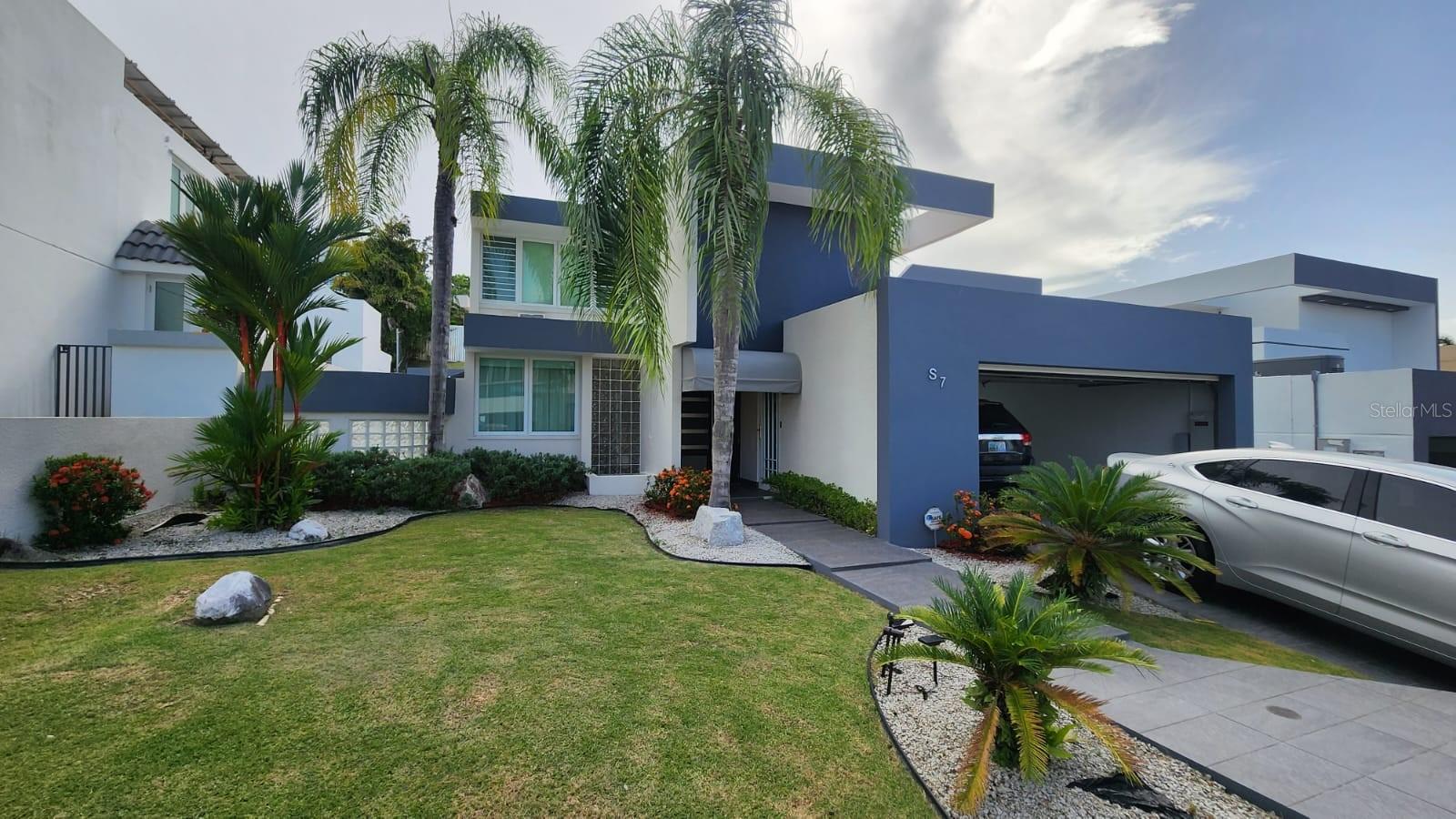 Property Details:
• Location: Quintas Reales, Guaynabo, Puerto Rico
• Type: 2-Story Home
• Bedrooms: 4
• Bathrooms: 2 full baths, 1 powder room
• Lot Size: 445 square meters
• Living Space: 1,754 sq feet + terrace
Features and Amenities:
• Remodeled Kitchen: Equipped with a side-by-side refrigerator, stove, oven, microwave, dishwasher, washer, and dryer
• Utilities: 200-gallon water tank and an 18k backup gas power generator
• Climate Control: 5 mini split AC units (including living room) plus ceiling fans
• Outdoor Space: Enormous, covered terrace with a gas BBQ grill
• Parking: Covered 2-car garage with electric door
• Location: Cul-de-sac, across from fast food outlets, pharmacies, grocery stores, schools, and hospitals
• Security: Closed neighborhood with 24/7 guard
• Convenience: 15 minutes to Plaza las Americas, 25 minutes to the International Airport
Additional Information:
• Tenant Screening: Credit, background, and payment capability checks required
• Showings: By appointment only to qualified customers Available November 2025.