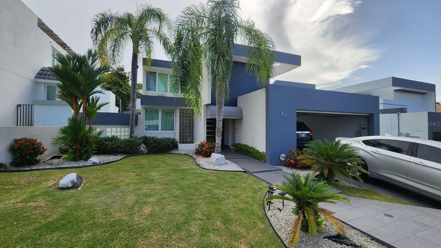 Property Details:
• Location: Quintas Reales, Guaynabo, Puerto Rico
• Type: 2-Story Home
• Bedrooms: 4
• Bathrooms: 2 full baths, 1 powder room
• Lot Size: 445 square meters
• Living Space: 1,754 sq feet + terrace
Features and Amenities:
• Remodeled Kitchen: Equipped with a side-by-side refrigerator, stove, oven, microwave, dishwasher, washer, and dryer
• Utilities: 200-gallon water tank and an 18k backup gas power generator
• Climate Control: 5 mini split AC units (including living room) plus ceiling fans
• Outdoor Space: Enormous, covered terrace with a gas BBQ grill
• Parking: Covered 2-car garage with electric door
• Location: Cul-de-sac, across from fast food outlets, pharmacies, grocery stores, schools, and hospitals
• Security: Closed neighborhood with 24/7 guard
• Convenience: 15 minutes to Plaza las Americas, 25 minutes to the International Airport
Additional Information:
• Tenant Screening: Credit, background, and payment capability checks required
• Showings: By appointment only to qualified customers Available November 2025.