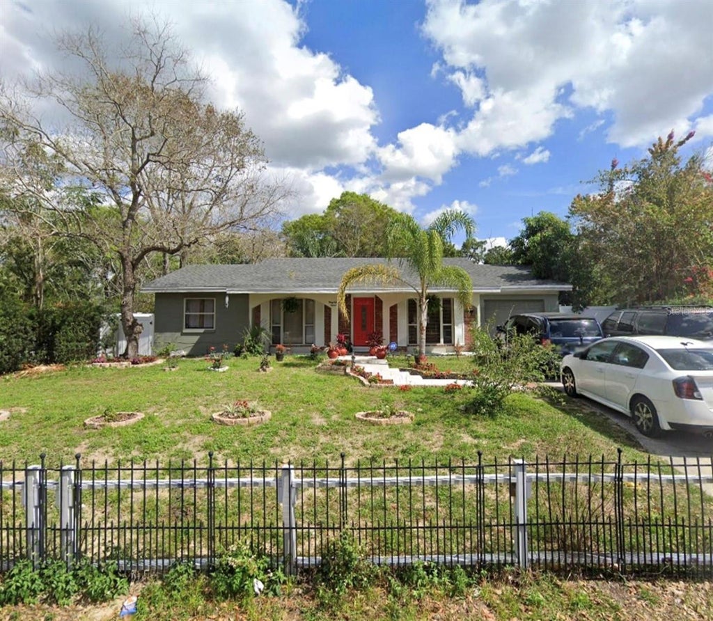 Photo of 3815 Mitchell Road, Orlando, FL 32808 (MLS # O6424275)