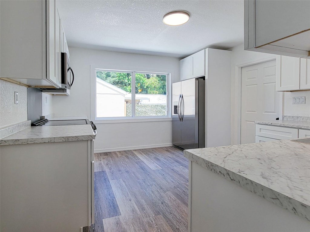 Photo of 1520 19th Avenue W, Bradenton, FL 34205 (MLS # A4695910)