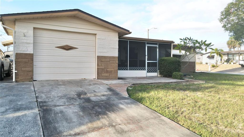 Photo of 4935 Guardian Avenue, Holiday, FL 34690 (MLS # TB8427737)