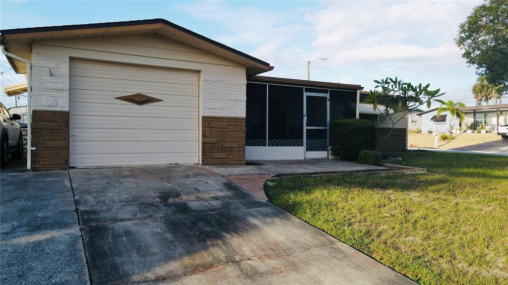 Photo of 4935 Guardian Avenue, Holiday, FL 34690 (MLS # TB8427737)