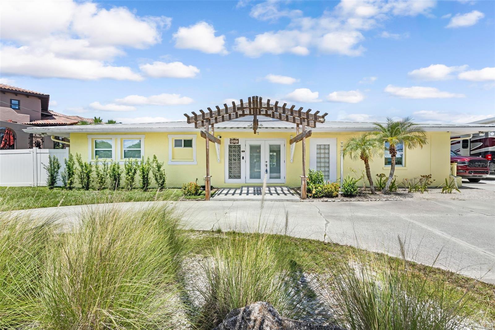 Discover the lifestyle you've been dreaming of with this fully remodeled 3-bedroom, 2-bath waterfront oasis. Located on a wide, sailboat-worthy canal with unrestricted deep-water access to Tampa Bay and the Gulf, this 1,954 sq. ft. home is built for both comfort and adventure. From the moment you walk in, you’ll be captivated by the open layout, a wall of windows flooding the great room and kitchen with natural light, and panoramic views of your private slice of paradise. The kitchen, fully updated in 2024, boasts brand-new appliances, a large cooking island with seating, ample cabinet space, and a walk-in pantry so big (6’x5’) it deserves its own zip code. But this home isn't just beautiful, it's incredibly functional. Storage enthusiasts will appreciate the oversized owner’s suite closet (6’x13’), inside laundry room, utility room, and a separate office space. Outdoor lovers will find everything they need in the backyard: a resurfaced in-ground pool and spa (2024), a 90’ seawall, a 10’x40’ composite dock with electric and water, and a 16,000XL boat lift for extra-long vessels. Jet ski fan? There are two davits and a concrete pad to keep your toys ready to launch. Need space for an RV or boat trailer? You’ve got that, too.
Located in an unincorporated area with no CDD fees, no HOA, and minimal county rules, you’ll enjoy the freedom to live as you please. Optional community membership offers access to a private boat ramp and clubhouse. Commuters and beachgoers alike will love the quick access to I-75, I-275, US-19, and US-41, making travel to St. Pete, Tampa, Bradenton, Sarasota, or Anna Maria Island a breeze. Whether you’re chasing sunsets or setting sail for open waters, this exceptional waterfront paradise has it all. Schedule your showing today before it’s gone!