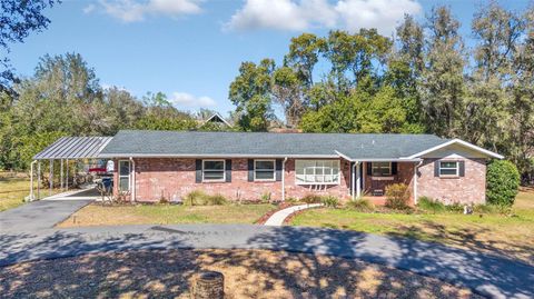Photo of 23041 Dewitt Drive, Brooksville, FL 34601 (MLS # W7883391)