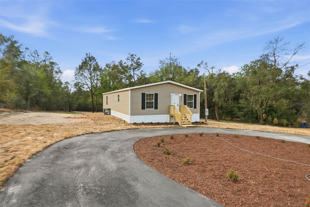 Photo of 25924 Whipperwill Street, Brooksville, FL 34601 (MLS # TB8476734)