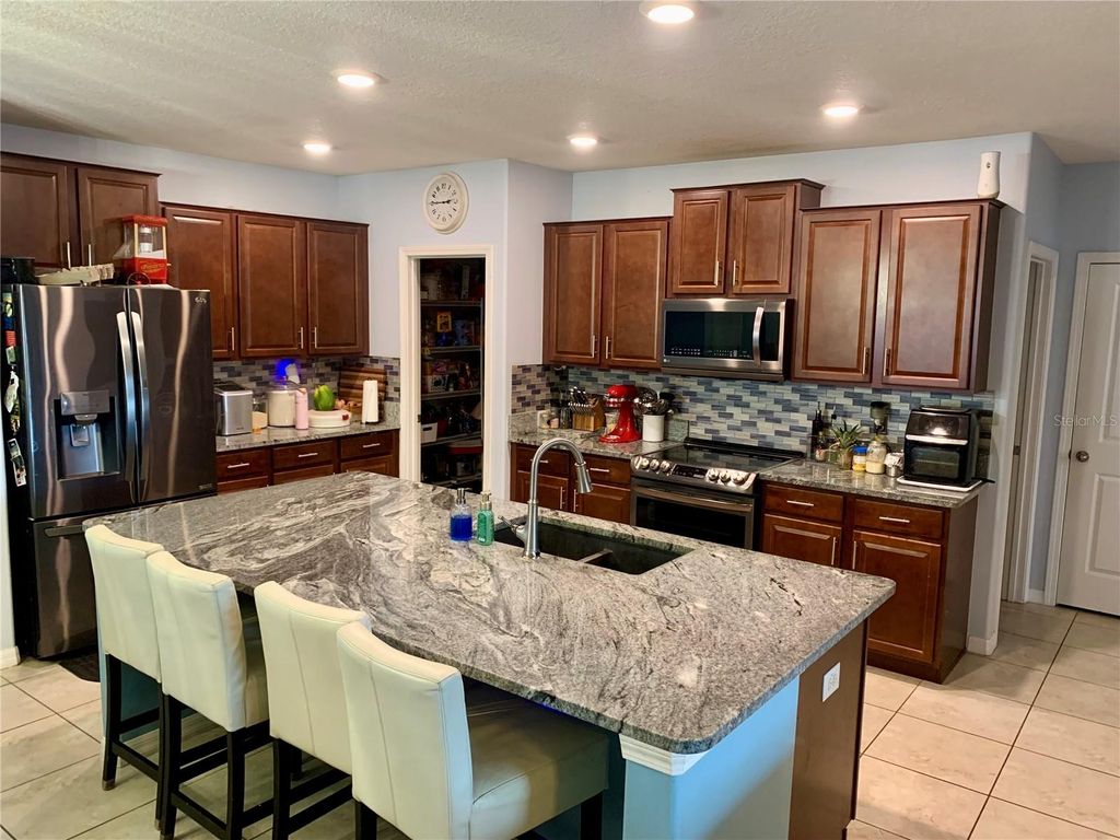 Photo of 4935 Reflecting Pond Circle, Wimauma, FL 33598 (MLS # A4677947)