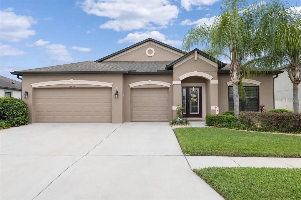Photo of 18620 Cortes Creek Boulevard, Spring Hill, FL 34610 (MLS # A4654633)