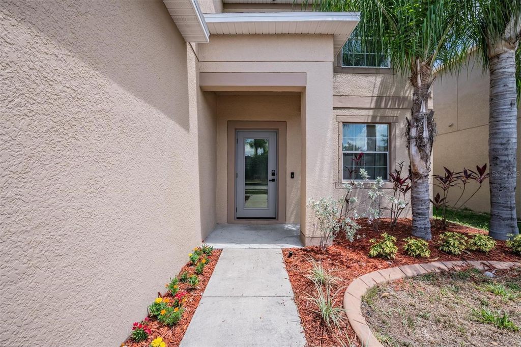 Photo of 15415 Long Cypress Drive, Ruskin, FL 33573 (MLS # TB8508718)