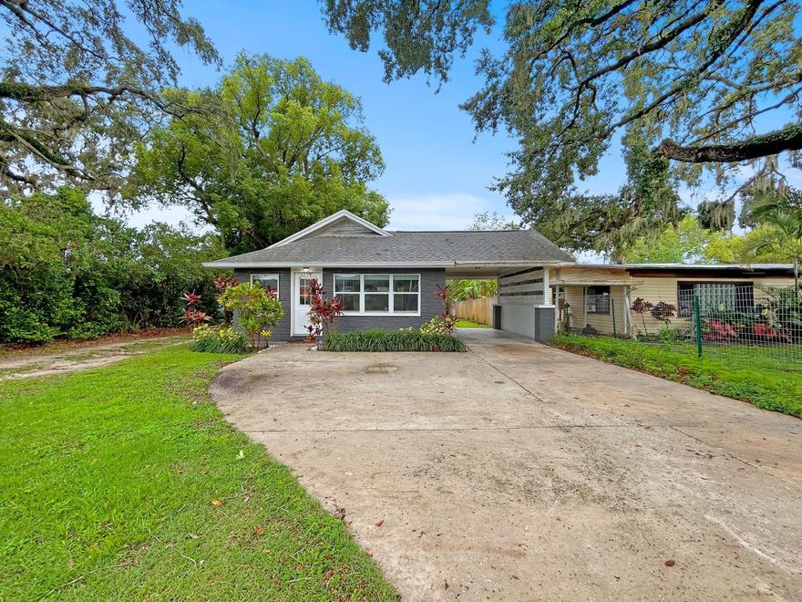 Two units. Two income streams. Zero downtime. Welcome to 1718 Lavon Street, a fully renovated 1940 bungalow tucked beneath mature live oaks in Lakeland’s growing Midtown district. Rich with historic charm and thoughtfully updated, this property blends timeless character with immediate income-producing potential.
Inside the main residence, the original wood-burning fireplace anchors the living space while modern finishes create a clean, updated feel throughout. The kitchen features white shaker cabinetry, new countertops, stainless steel appliances, matte black fixtures, and vinyl plank flooring. The renovated bath showcases large-format tile and a wood-tone vanity. The flexible layout includes two rooms plus a bonus room with interior laundry, covered carport access, and a large fully fenced backyard.
What truly sets this property apart is its proven dual-income opportunity. The primary home currently operates as a successful short-term rental with average gross earnings of $24,673 over 11 months ($2,243/month average). The detached 1-bedroom guest house, built in 2020, is separately leased for $750/month with an active tenant already in place. Both units occupied at time of listing.
Sold fully furnished with transferable Airbnb listing and future bookings, this is a rare turnkey opportunity with no ramp-up period, furnishing expense, or vacancy gap to absorb. Income begins immediately.
Located in the City of Lakeland Midtown CRA, just minutes from Lakeland Regional Health, Joker Marchant Stadium, downtown Lakeland, dining, shopping, and entertainment. Convenient access to I-4 places the property centrally between Tampa and Orlando, making it attractive for commuters, travelers, and short-term rental demand alike. Lakeland’s continued growth and central Florida location make this an excellent opportunity for investors and owner-occupants alike.