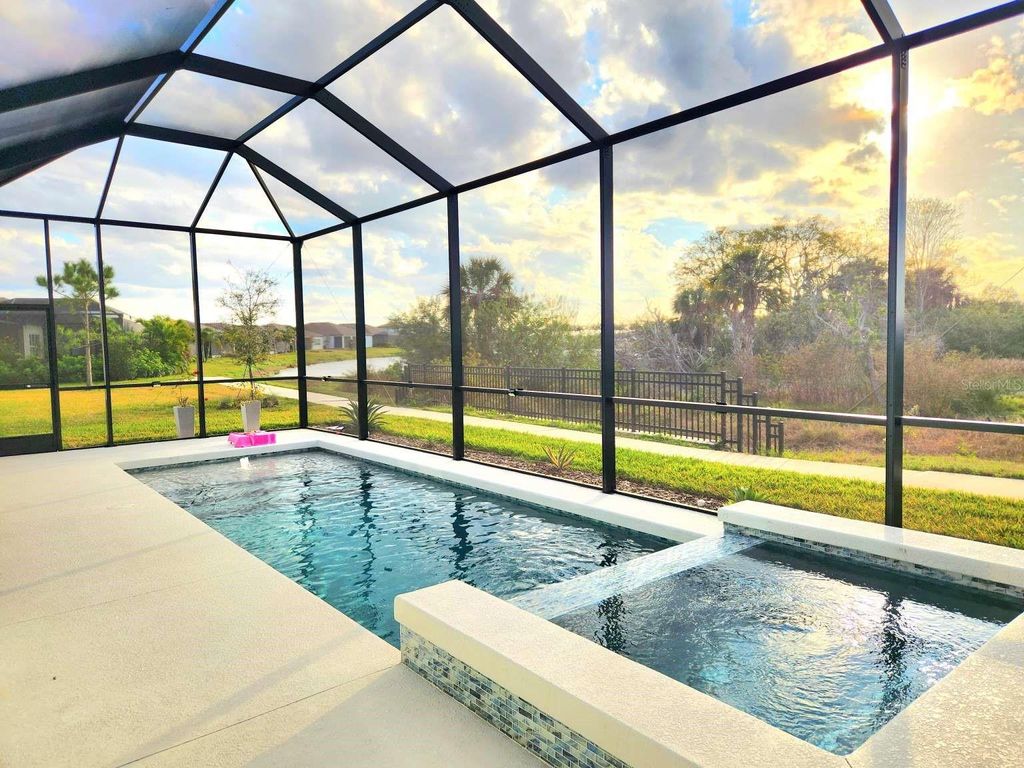 Photo of 9024 Barrier Coast Trail, Parrish, FL 34219 (MLS # TB8481834)