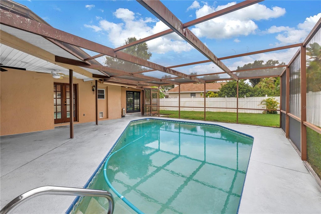 Photo of 9212 Rustic Pines Boulevard W, Seminole, FL 33776 (MLS # TB8525878)