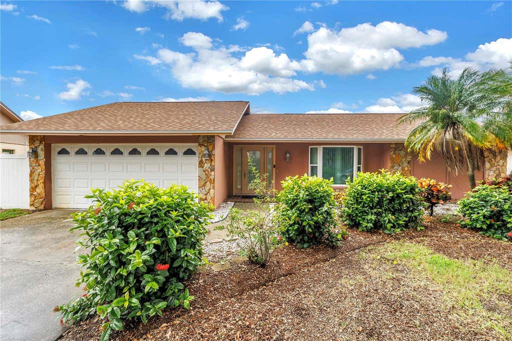 Photo of 9212 Rustic Pines Boulevard W, Seminole, FL 33776 (MLS # TB8525878)