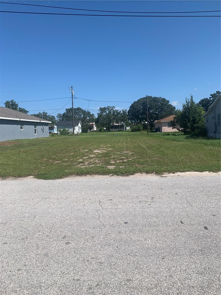 Cleared and ready to build in the Lake Wales CRA District. No HOA, and no CDD. Behind the lot is a dirt alley.
Buyers to verify building options and requirements with the City of Lake Wales, before going under contract.
All information including measurements are approximate and should be verified by buyers and/or buyer’s agent.