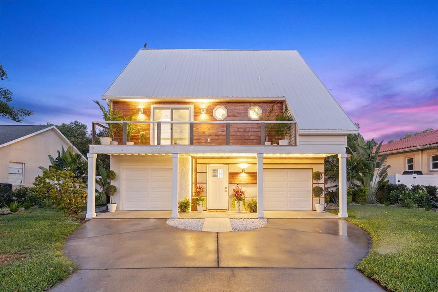 Experience waterfront living nestled by the serene beauty of Tampa Bay's open waters. Embrace the privacy offered by surrounding mangroves, ensuring a tranquil Florida lifestyle. This property accommodates your boats, jet skis, kayaks, and paddleboards with a dedicated dock. A spacious driveway leads to two garage bays while the ground floor hosts a versatile game room, perfect for both work and play.

The second floor boasts an airy layout featuring a sprawling eat-in kitchen, dining area, and living space, all overlooking a panoramic view through expansive sliders onto the deck. The lush Florida foliage frames the open water vista, creating a picturesque backdrop. A front family room offers flexibility, complete with its own private deck and convenient access to a half bath.

On the third floor, both bedrooms feature en suite baths and private balconies. Each room in this house encourages an outdoor lifestyle, inviting you to relish the natural surroundings. Coquina Key, a delightful waterfront neighborhood just south of Downtown St. Petersburg, awaits. Merely minutes away from an array of enticing restaurants, entertainment venues, shopping centers, sports facilities, museums, the St. Pete Pier, and the Historic Vinoy Hotel and Park.

Enjoy the community amenities of Coquina Key including its own park, fishing dock, tennis and basketball courts, pickleball facilities, a dog park, playground, and scenic walking trails. Additionally, indulge in grilling and picnicking areas for more leisure, all within reach of your home. Embrace the joy of everyday life, where every moment holds the promise of fun and relaxation.